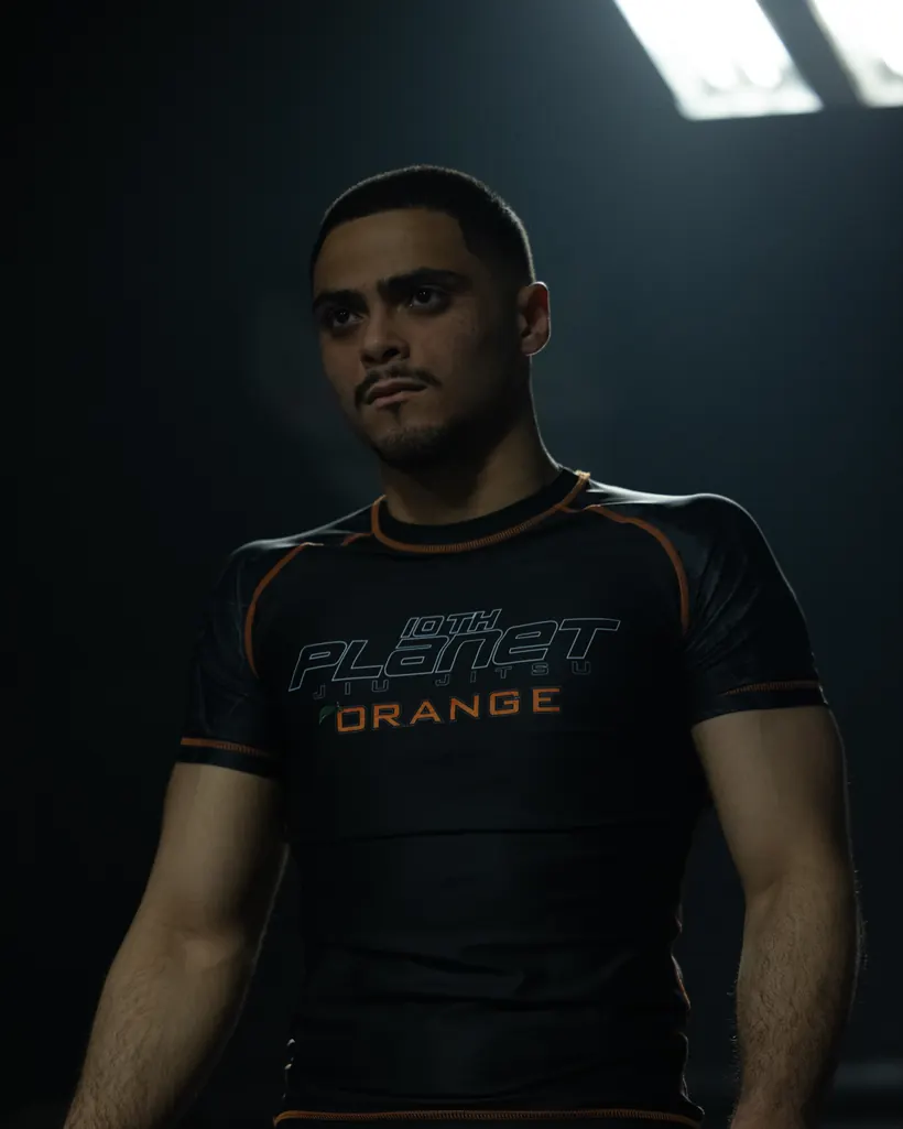 10th Planet Orange member in an academy rash guard