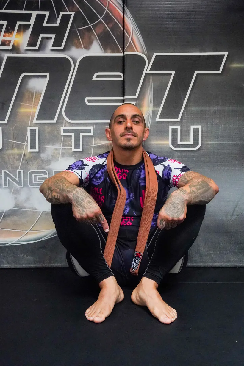Brown-belt coach at 10th Planet Orange